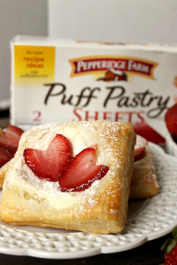 These Strawberries and Cream Pastries are sure to be a new family favorite! Made with 5 simple ingredients, it couldn't be easier to put together these gorgeous pastries. 