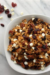 Sweet white chocolate chips and tangy dried cranberries make every bite of this White Chocolate Cranberry Pecan Granola Cereal an explosion of flavor.