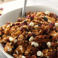 Sweet white chocolate chips and tangy dried cranberries make every bite of this White Chocolate Cranberry Pecan Granola Cereal an explosion of flavor.